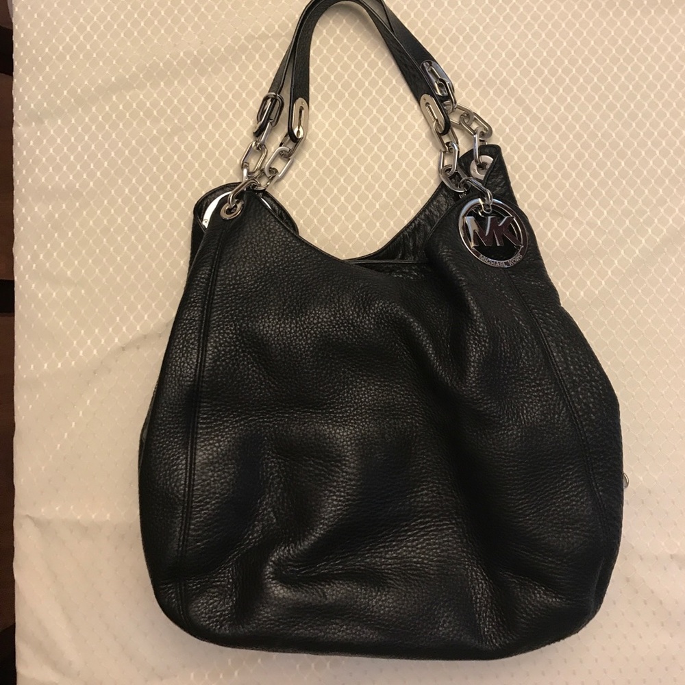 Michael Kors purse. Black with silver hardware.